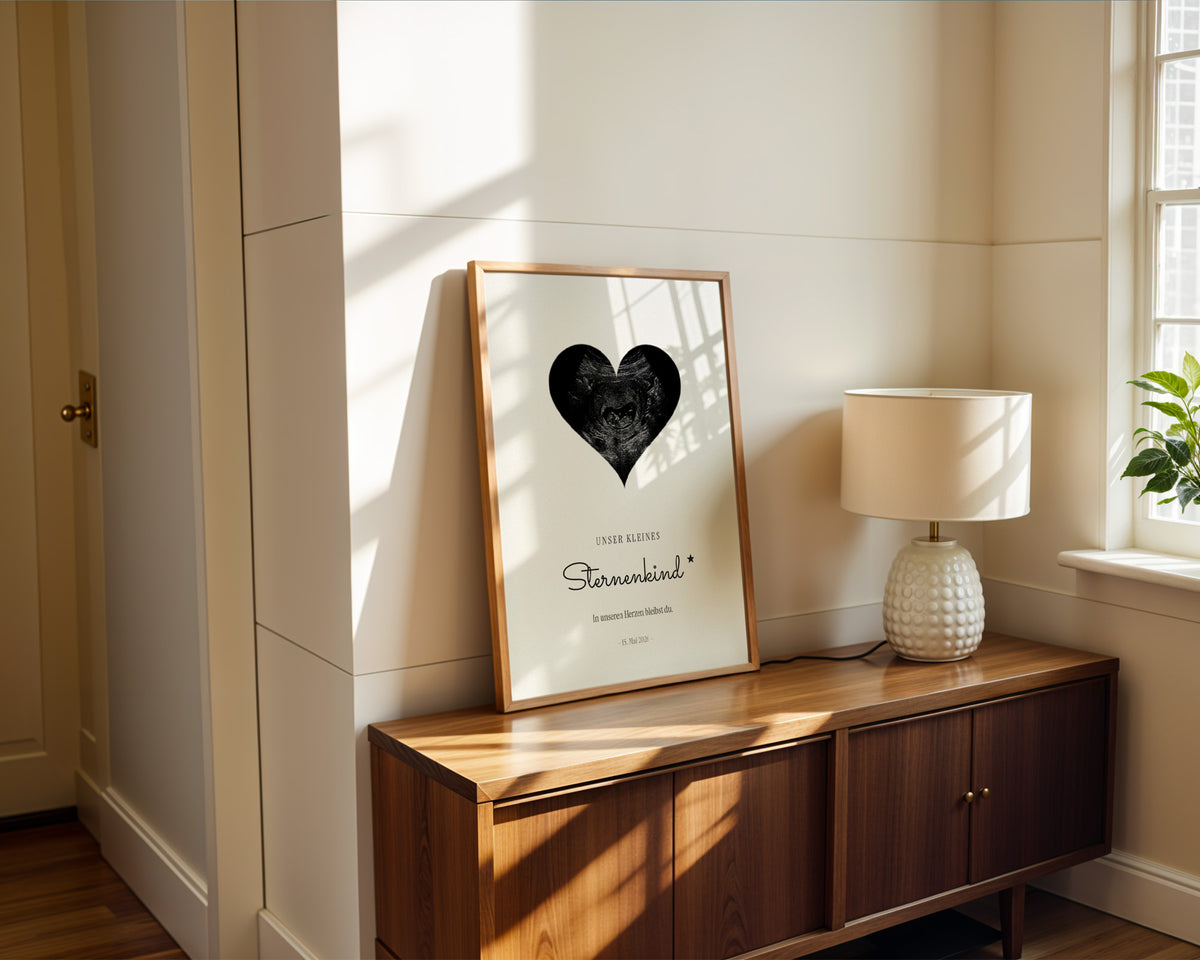 "Sternenkind" (angel baby) – ultrasound image as a heart – framed poster on the wall